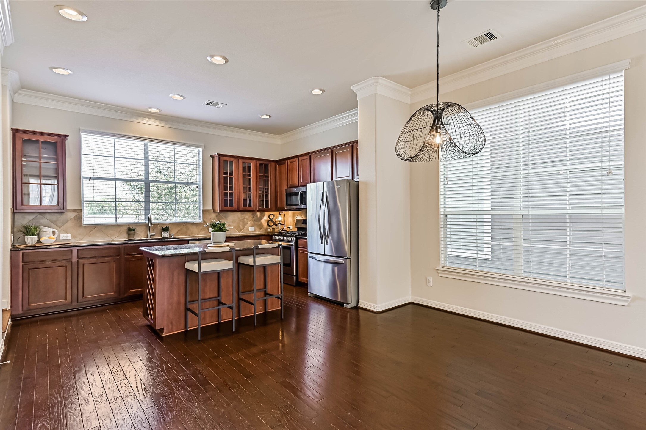 3208 Clearview Circle Houston, TX 77025 - Photo 12 of 30 Spacious kitchen and dining area with a large window and room to gather.