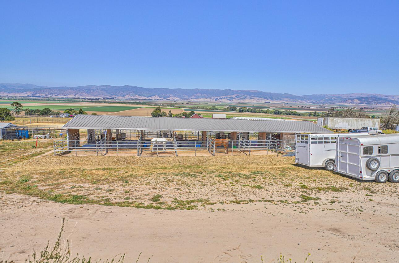 844 River Road Salinas, CA 93908 - Photo 13 of 76 a view of an ocean with a building in the background