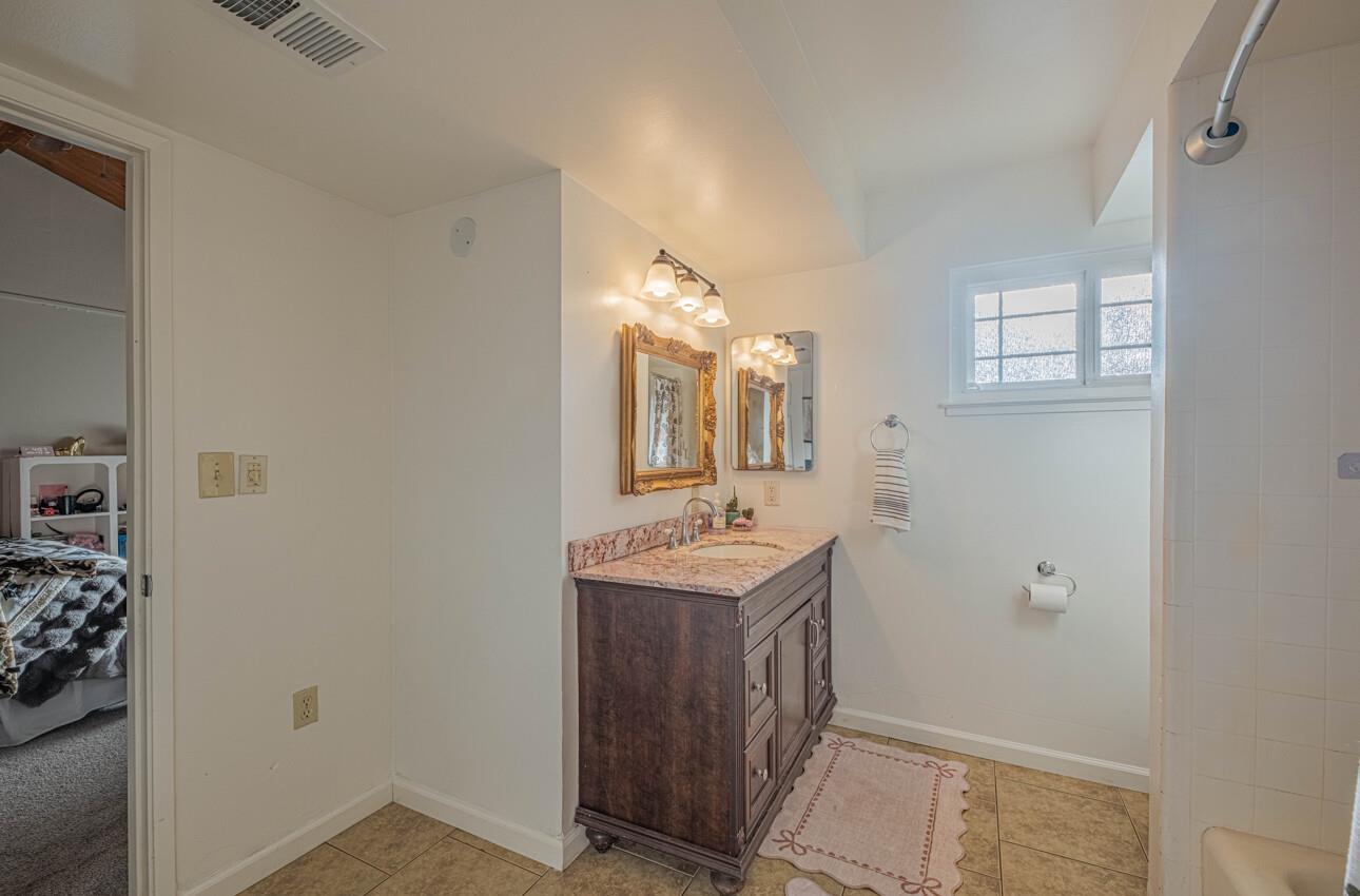 844 River Road Salinas, CA 93908 - Photo 50 of 76 a bathroom with a sink and a mirror