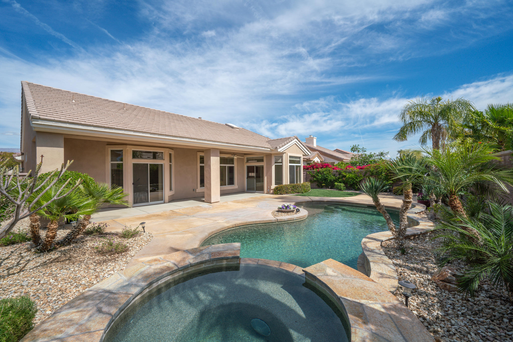 78655 Morning Star Palm Desert, CA 92211 - Photo 1 of 23 a view of a house with a yard