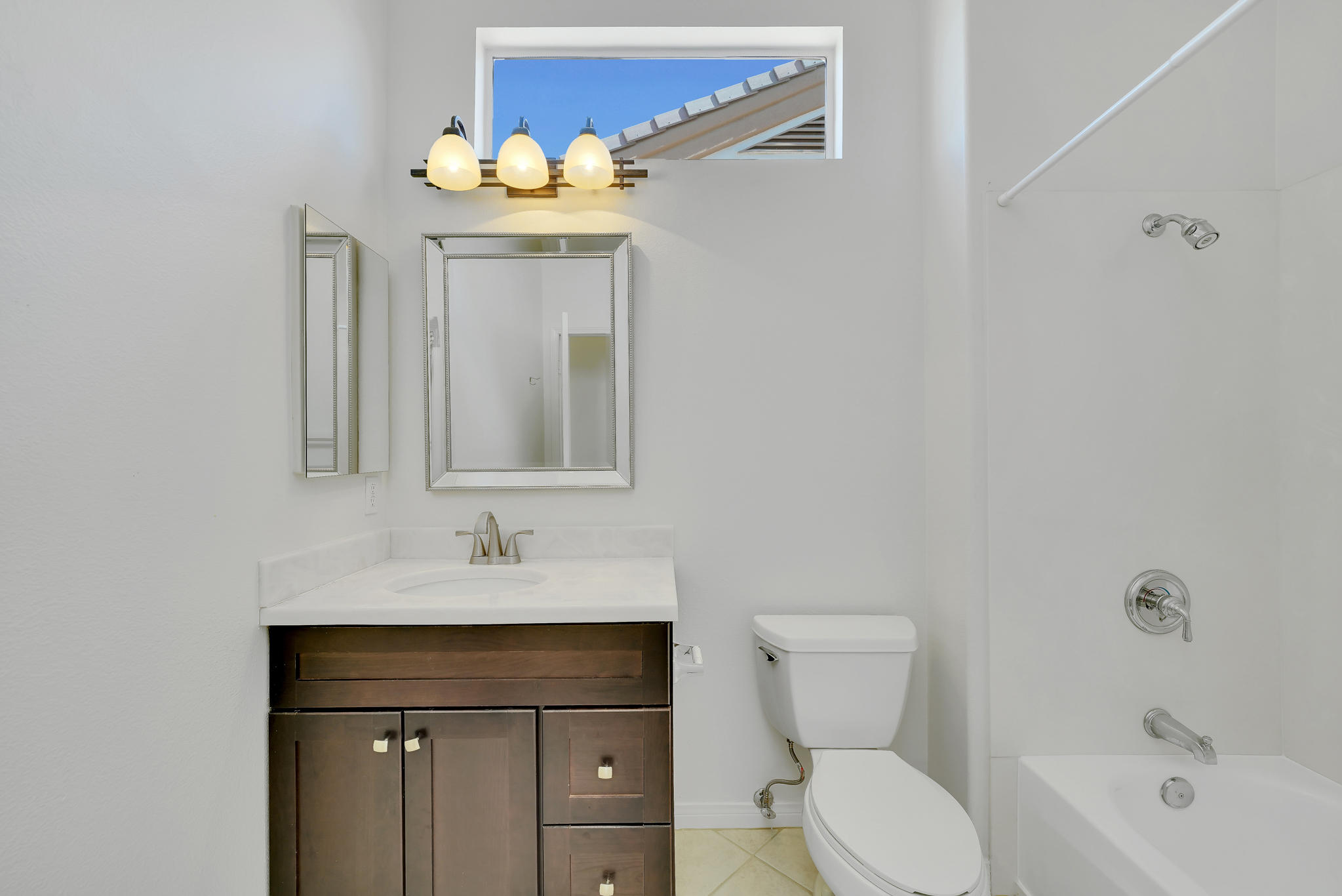 78655 Morning Star Palm Desert, CA 92211 - Photo 18 of 23 a bathroom with a sink vanity mirror and toilet