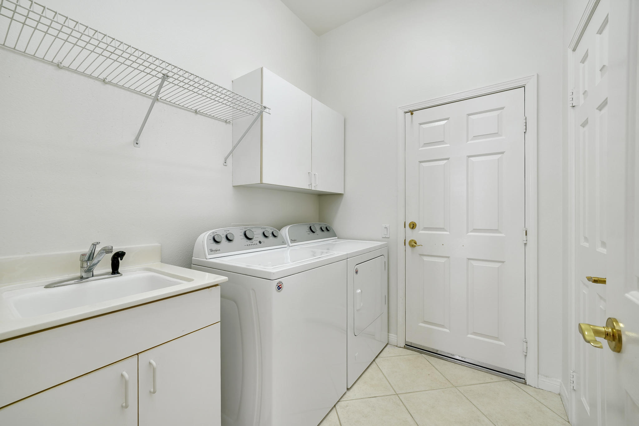 78655 Morning Star Palm Desert, CA 92211 - Photo 19 of 23 a utility room with dryer and washer