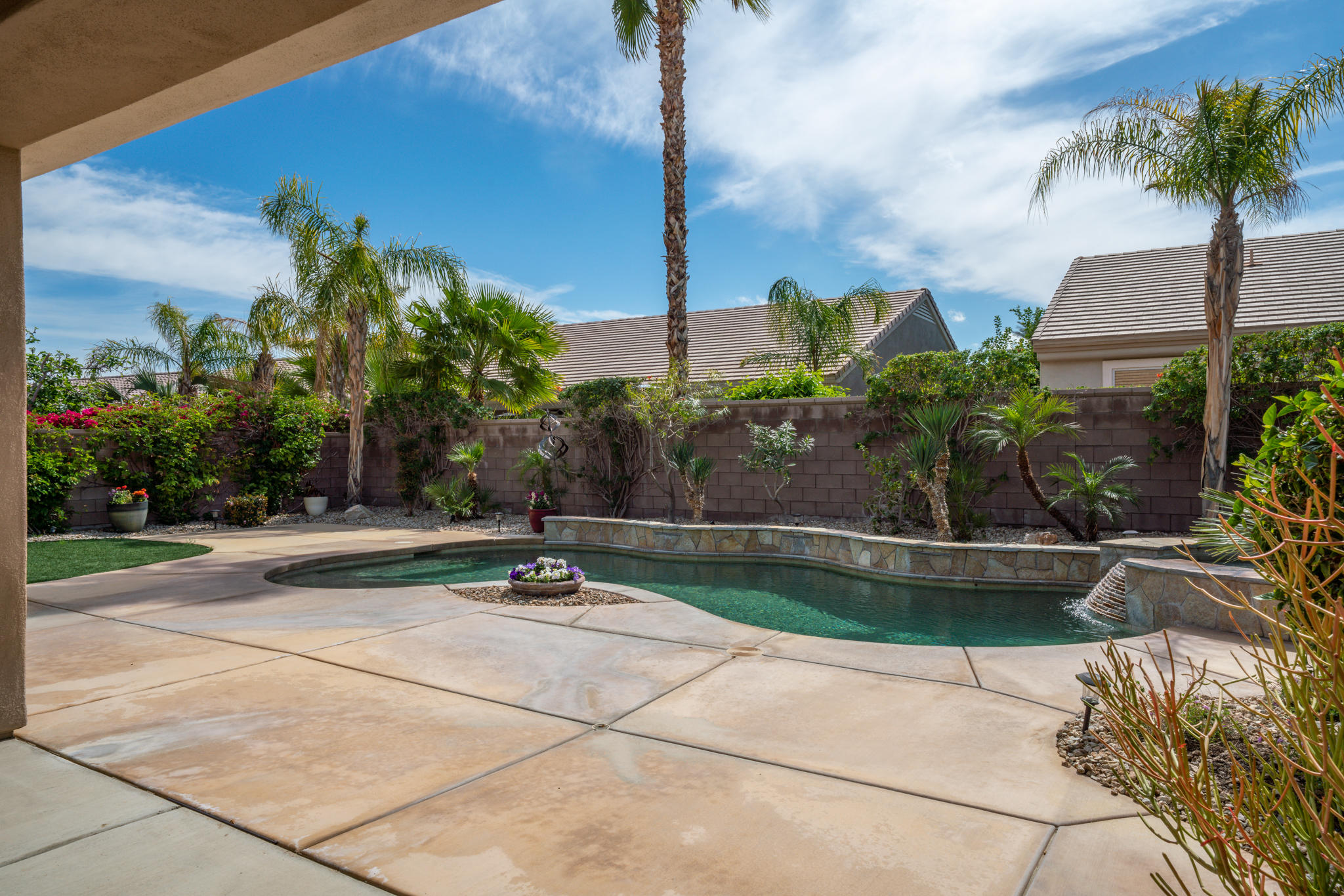 78655 Morning Star Palm Desert, CA 92211 - Photo 21 of 23 a view of a patio with a table and chairs