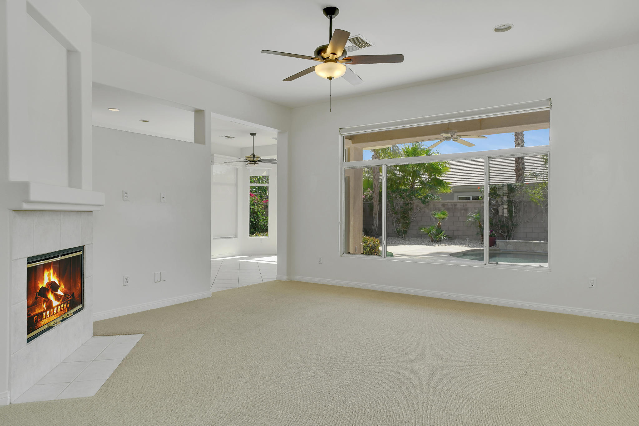 78655 Morning Star Palm Desert, CA 92211 - Photo 7 of 23 a view of room with window and ceiling fan