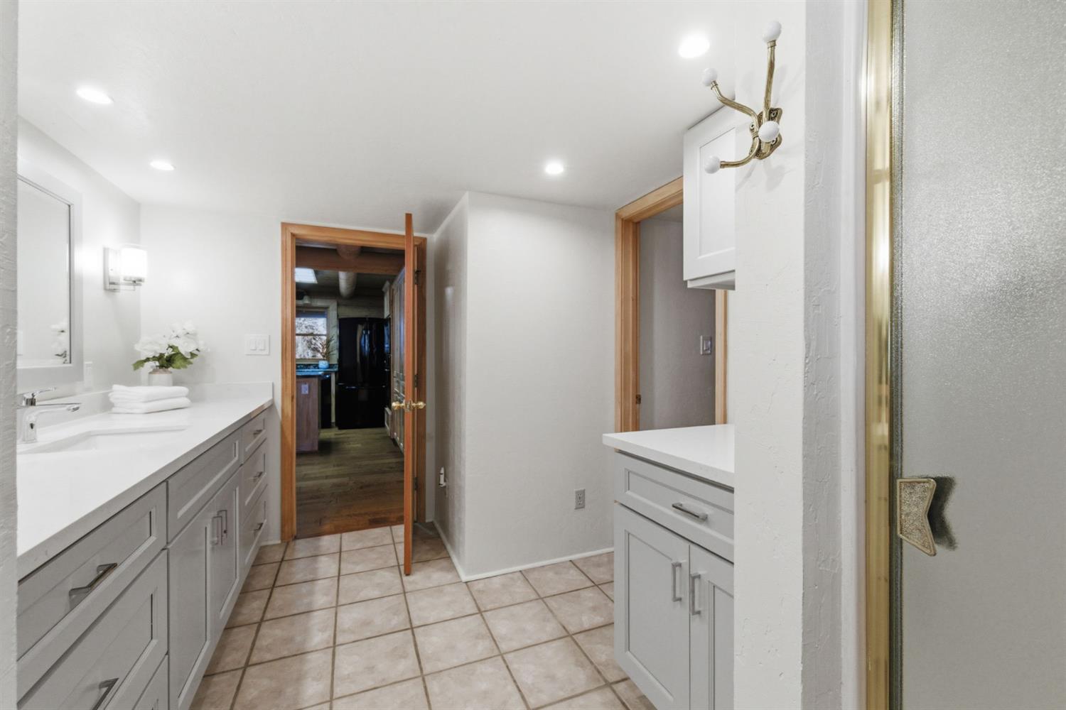 2428 Rancho Paradiso Arnold, CA 95223 - Photo 12 of 67 a bathroom with a sink a toilet and shower