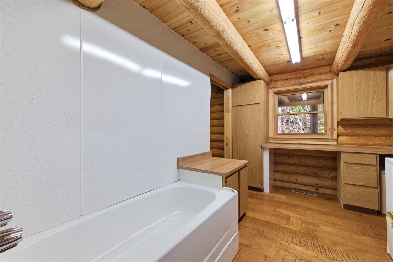 2428 Rancho Paradiso Arnold, CA 95223 - Photo 15 of 67 a bathroom with a sink and a bathtub