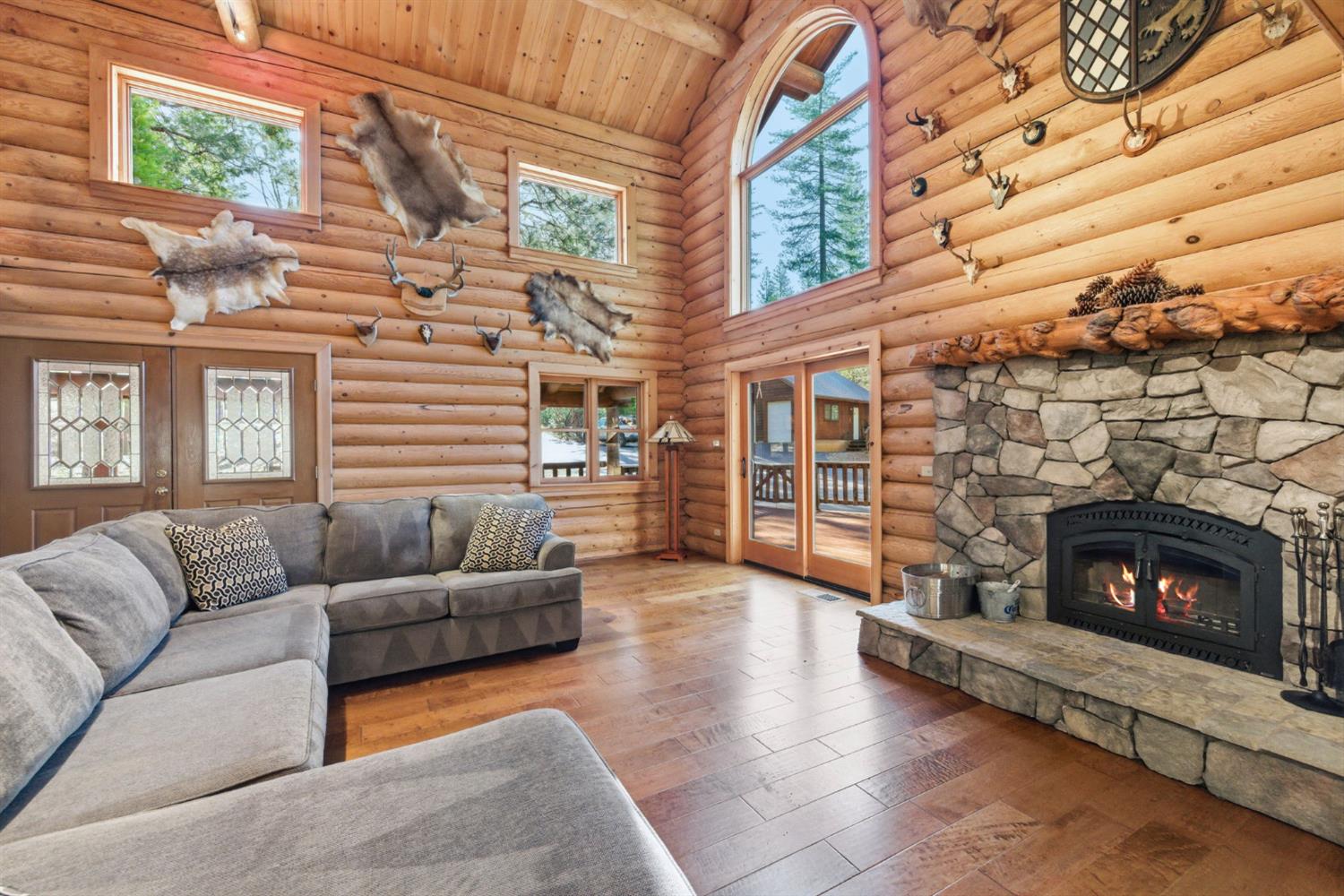 2428 Rancho Paradiso Arnold, CA 95223 - Photo 21 of 67 a living room with furniture and a fireplace