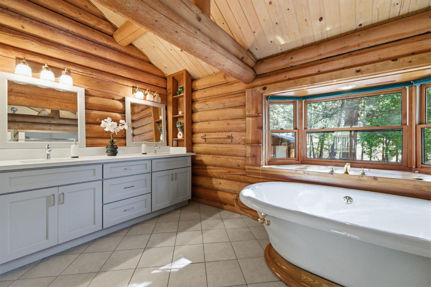 2428 Rancho Paradiso Arnold, CA 95223 - Photo 39 of 67 a bathroom with a granite countertop sink mirror bathtub and window