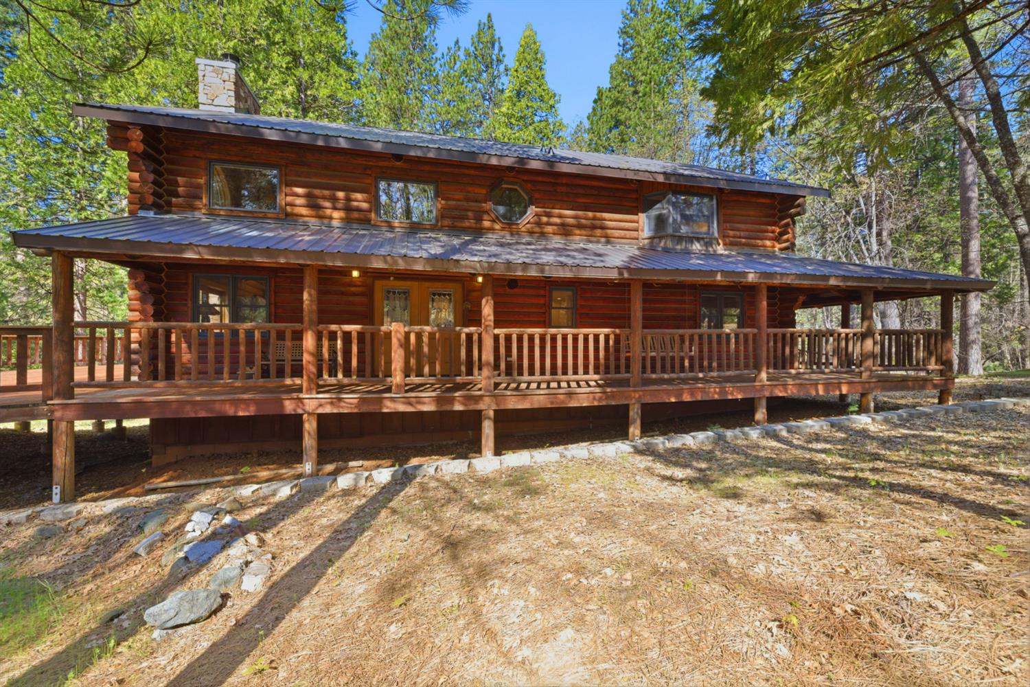 2428 Rancho Paradiso Arnold, CA 95223 - Photo 49 of 67 a view of a house with a wooden deck