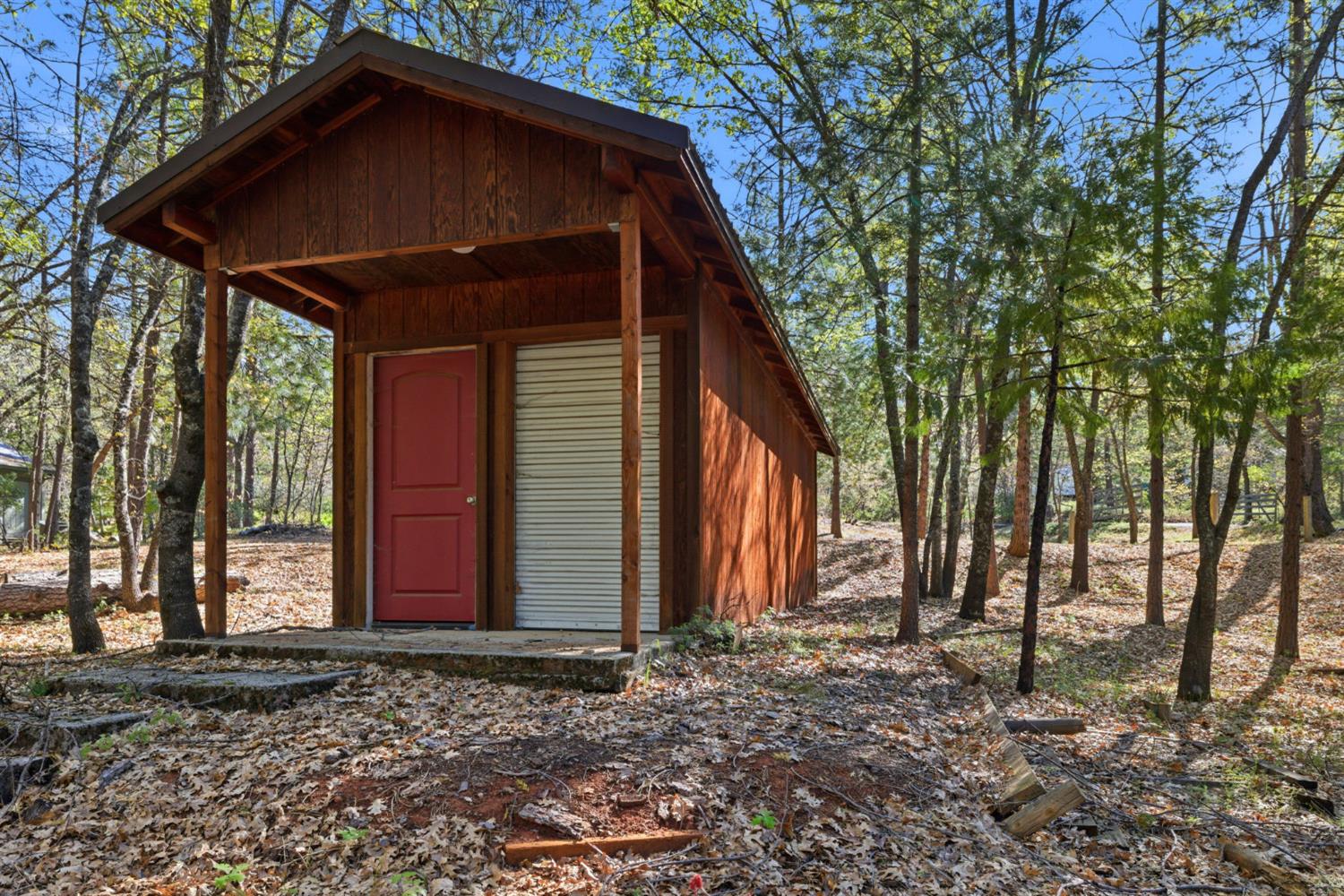 2428 Rancho Paradiso Arnold, CA 95223 - Photo 50 of 67 a house with trees in front of it
