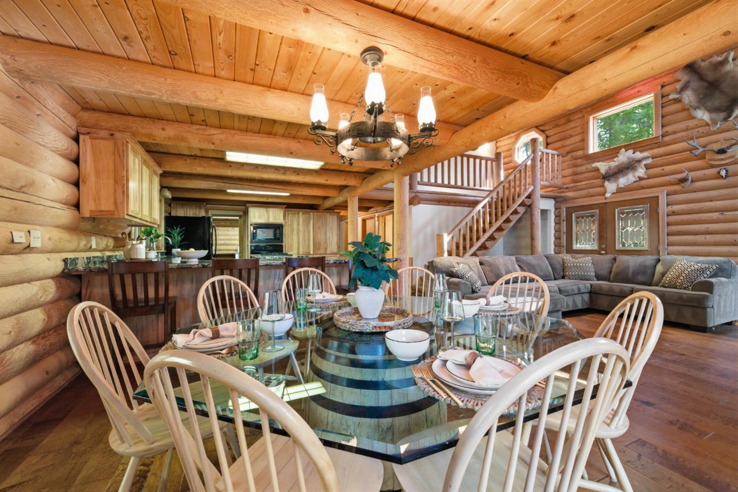 2428 Rancho Paradiso Arnold, CA 95223 - Photo 6 of 67 a view of a dining room and hall with furniture