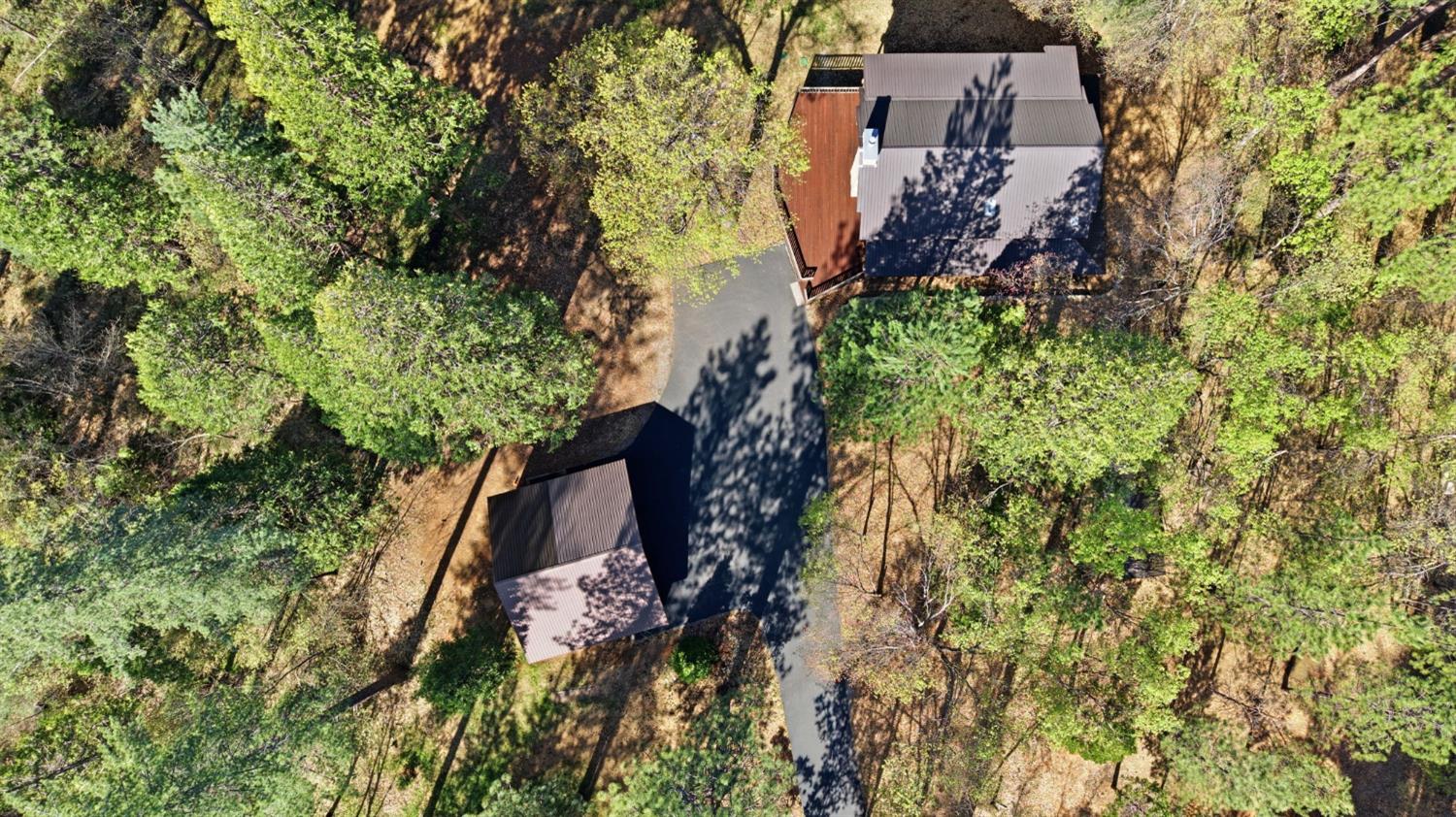 2428 Rancho Paradiso Arnold, CA 95223 - Photo 62 of 67 Welcome to 2428 Rancho Paradiso, a custom-built log home on 2.62 fully usable acres in the Sierra Foothills between Avery and Arnold. Extensively remodeled in 2002, this property delivers authentic mountain character with genuine luxury at every level, literally.