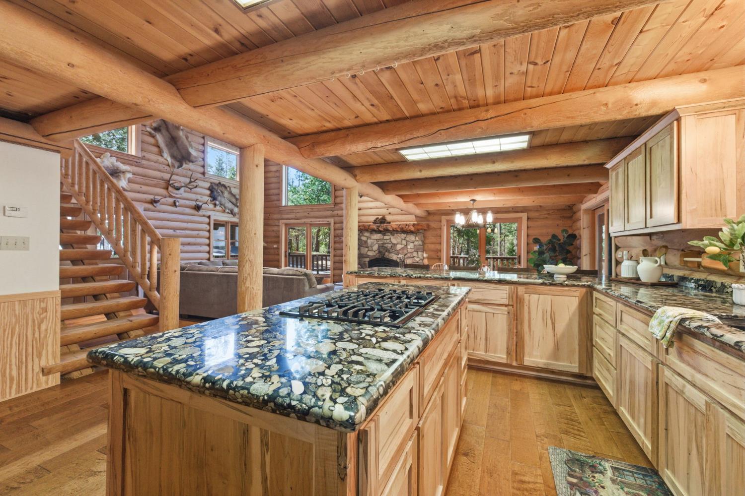 2428 Rancho Paradiso Arnold, CA 95223 - Photo 7 of 67 a kitchen with stainless steel appliances granite countertop a sink and cabinets