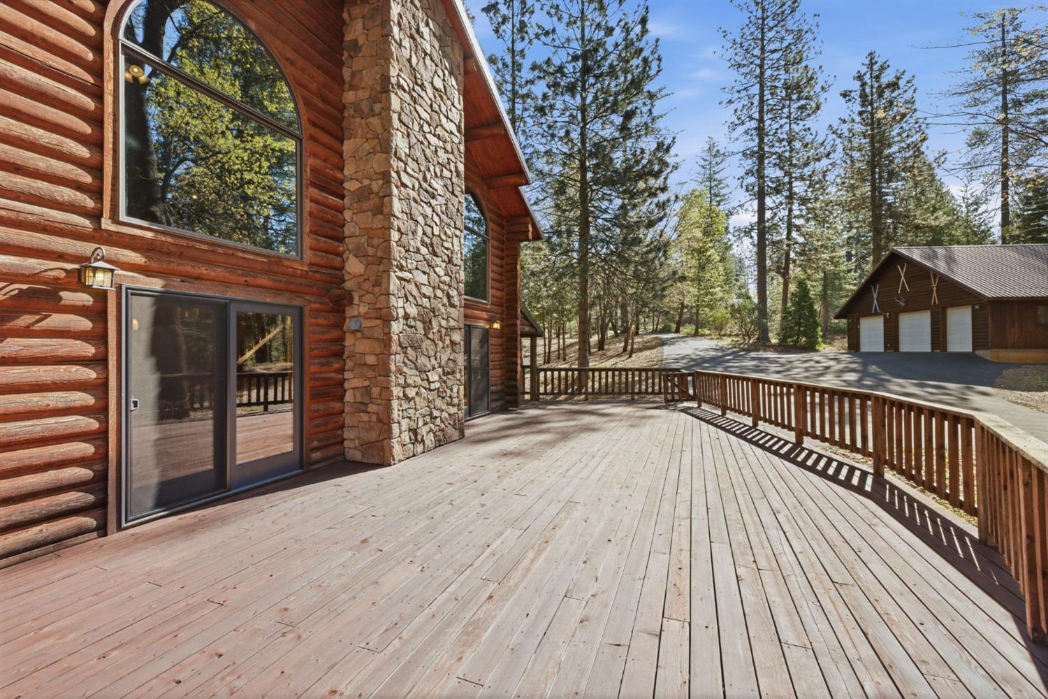 2428 Rancho Paradiso Arnold, CA 95223 - Photo 9 of 67 a view of balcony with wooden floor and fence