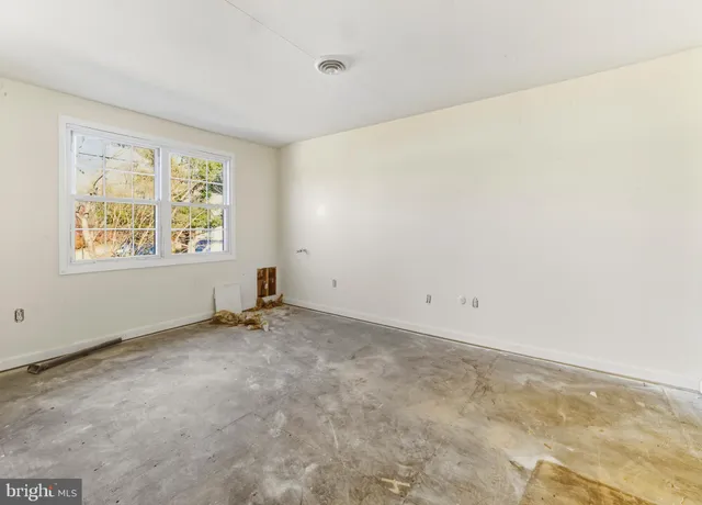 a view of livingroom with furniture and fireplace