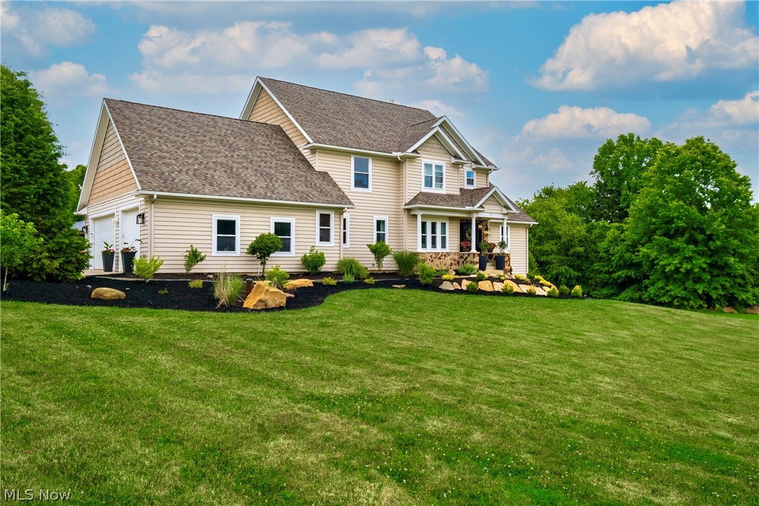 41 West Nimisila Road New Franklin, OH 44319 - Photo 1 of 50 with all new landscape and hardscape