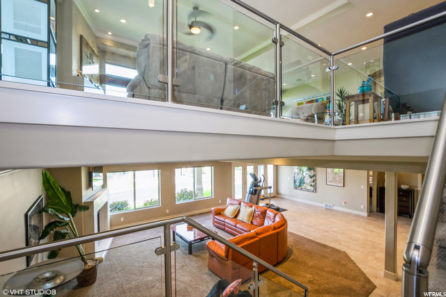 Undisclosed Address Draper, UT 84020 - Photo 1 of 1 HUGE feeling from the stair landing. Top and botton floors merge in light.