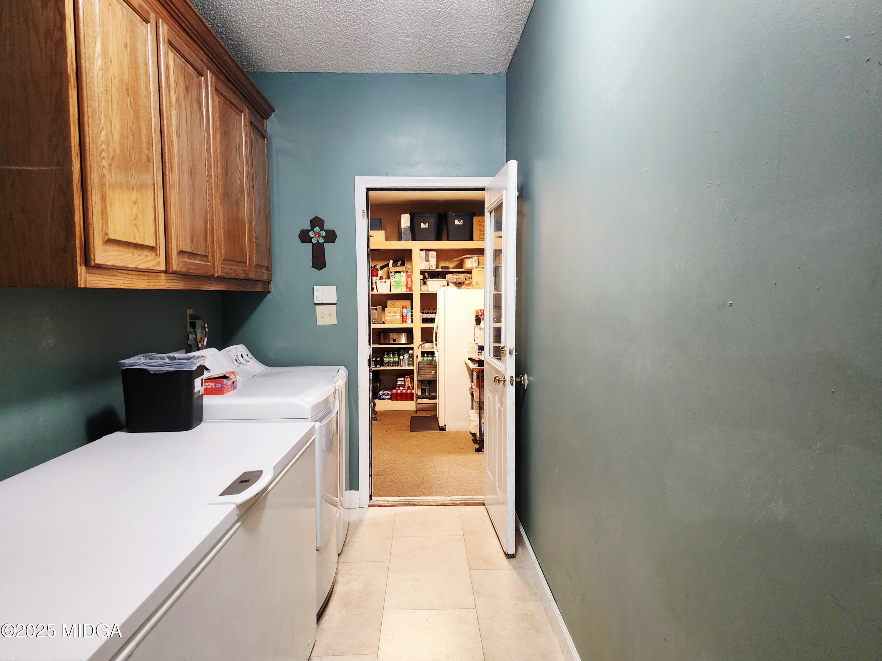 702 Carl Sutton Road Lizella, GA 31052 - Photo 16 of 43 a view of a kitchen with a stove