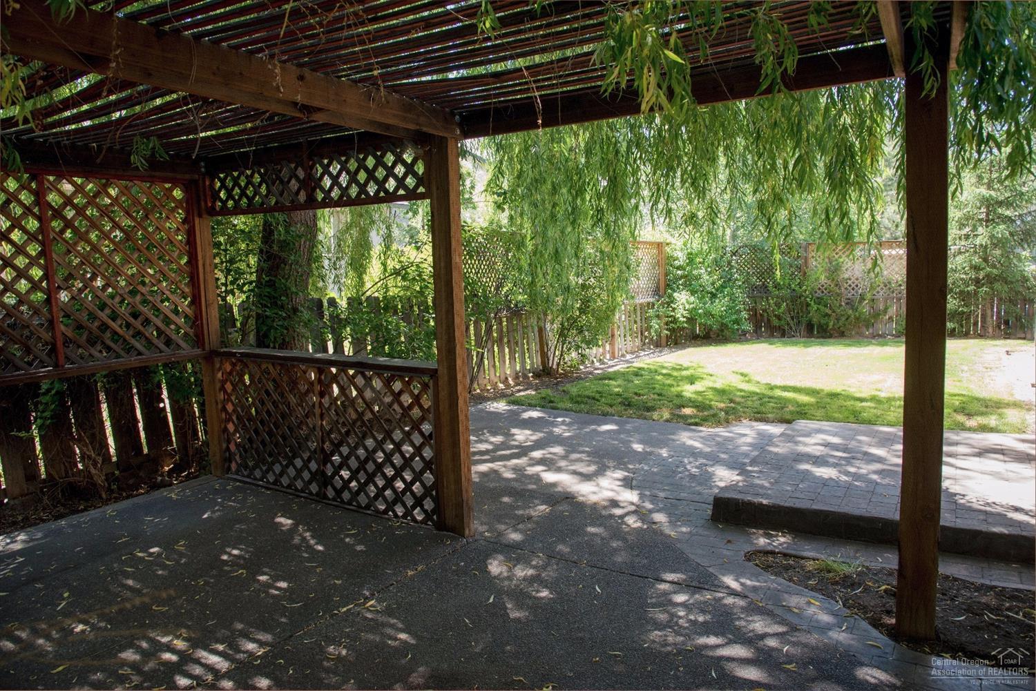 19967 Powers Road Bend, OR 97702 - Photo 21 of 22 Shady back patio affords tons of privacy