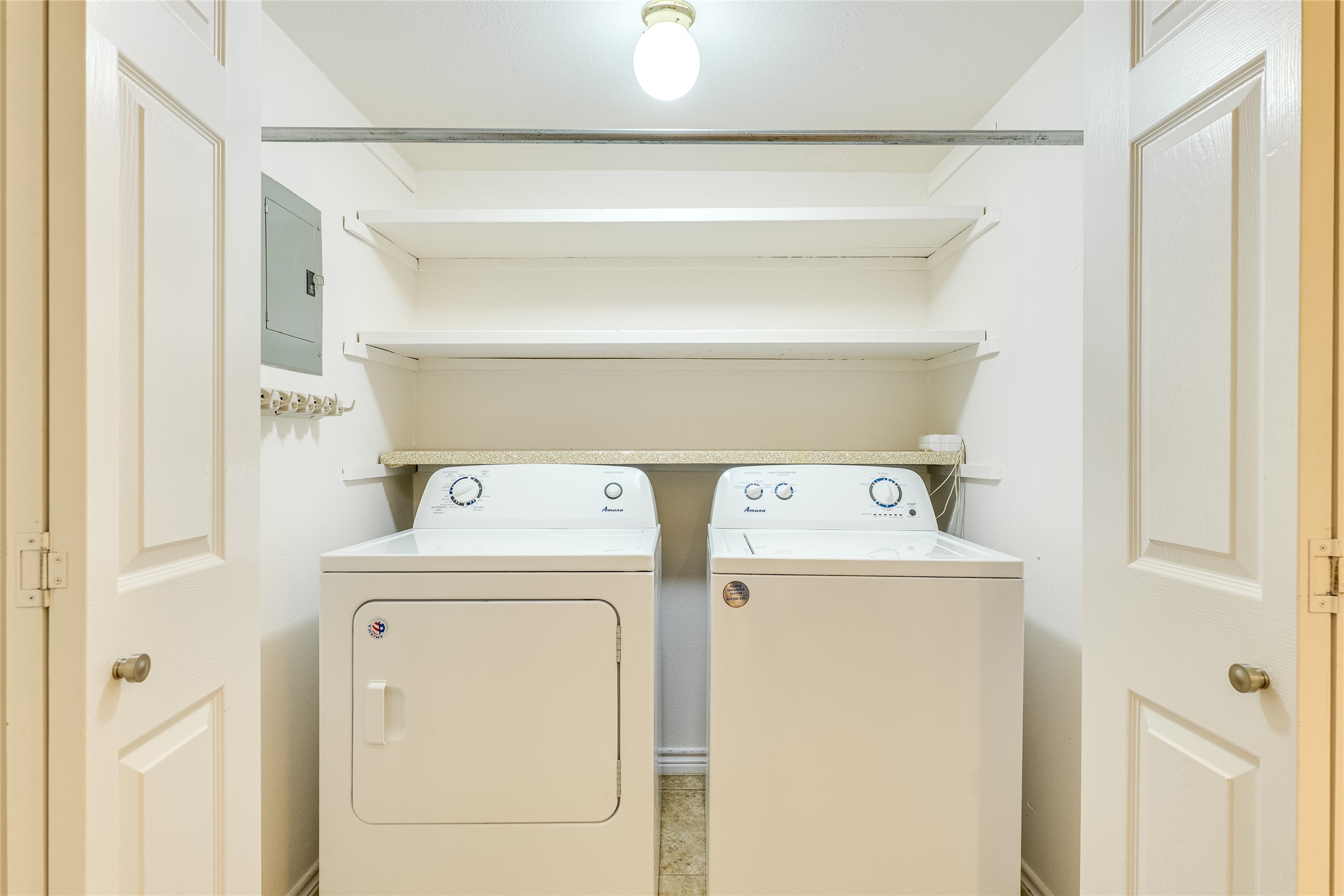 2500 Enfield Road, Unit 9 Austin, TX 78703 - Photo 14 of 26 Laundry room with washer and dryer