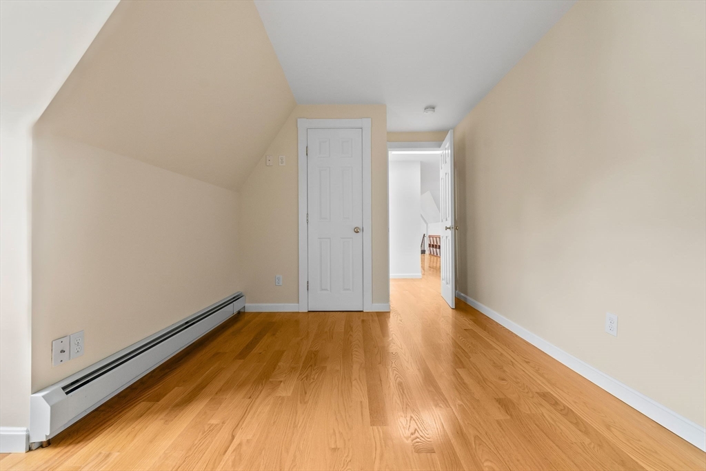 20 Ash Street, Unit 3 Danvers, MA 01923 - Photo 23 of 39 a view of a room with wooden floor