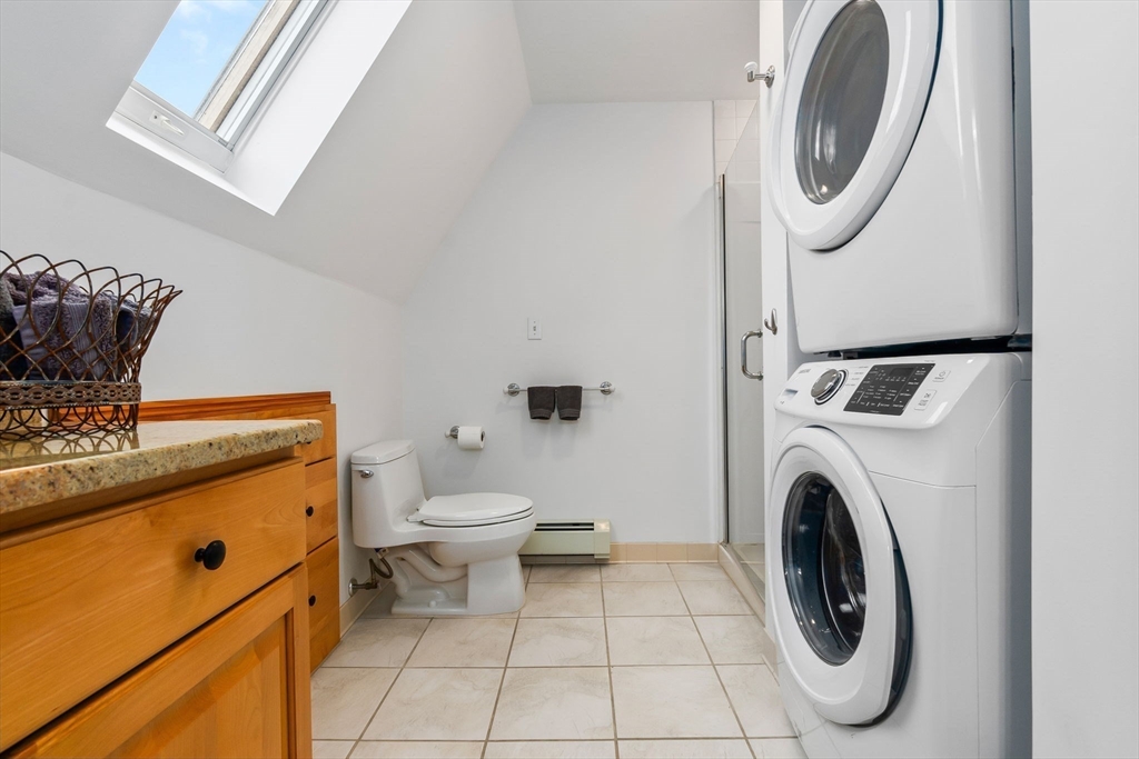20 Ash Street, Unit 3 Danvers, MA 01923 - Photo 24 of 39 a utility room with dryer and washer
