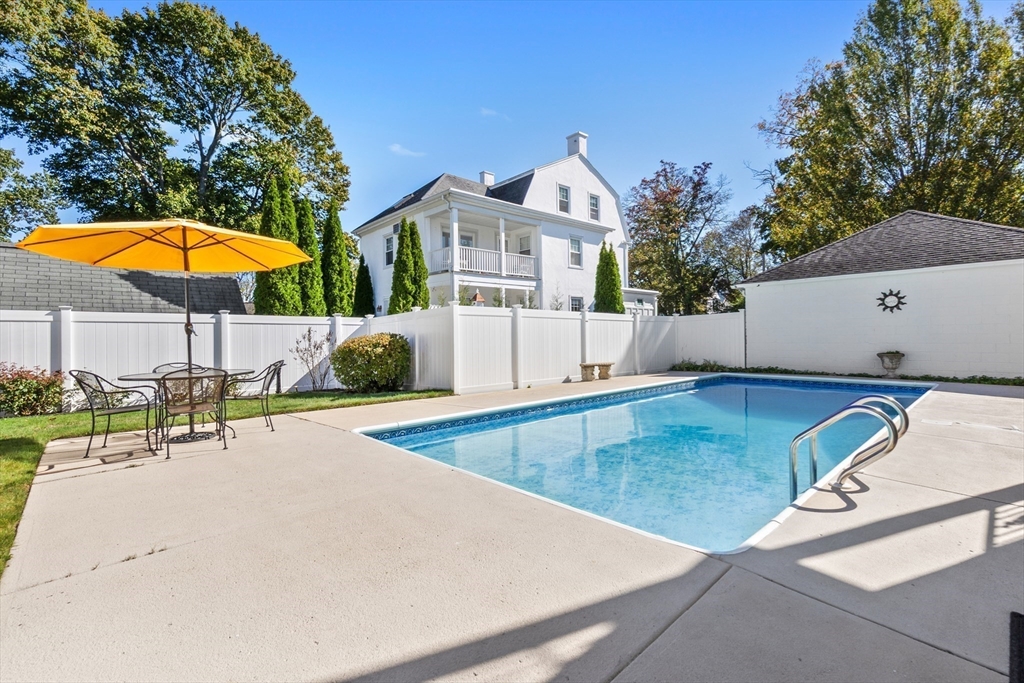 20 Ash Street, Unit 3 Danvers, MA 01923 - Photo 6 of 39 a view of a swimming pool with a patio