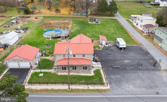 a view of entryway with wooden floor and a potted plant