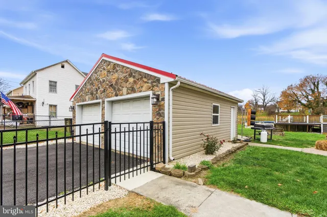 a view of a house with a big yard