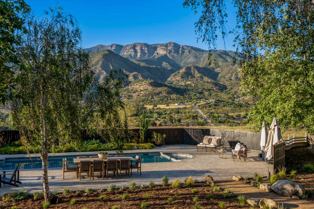13100 Ojai Road Santa Paula, CA 93060 - Photo 2 of 60 a view of a swimming pool with a patio
