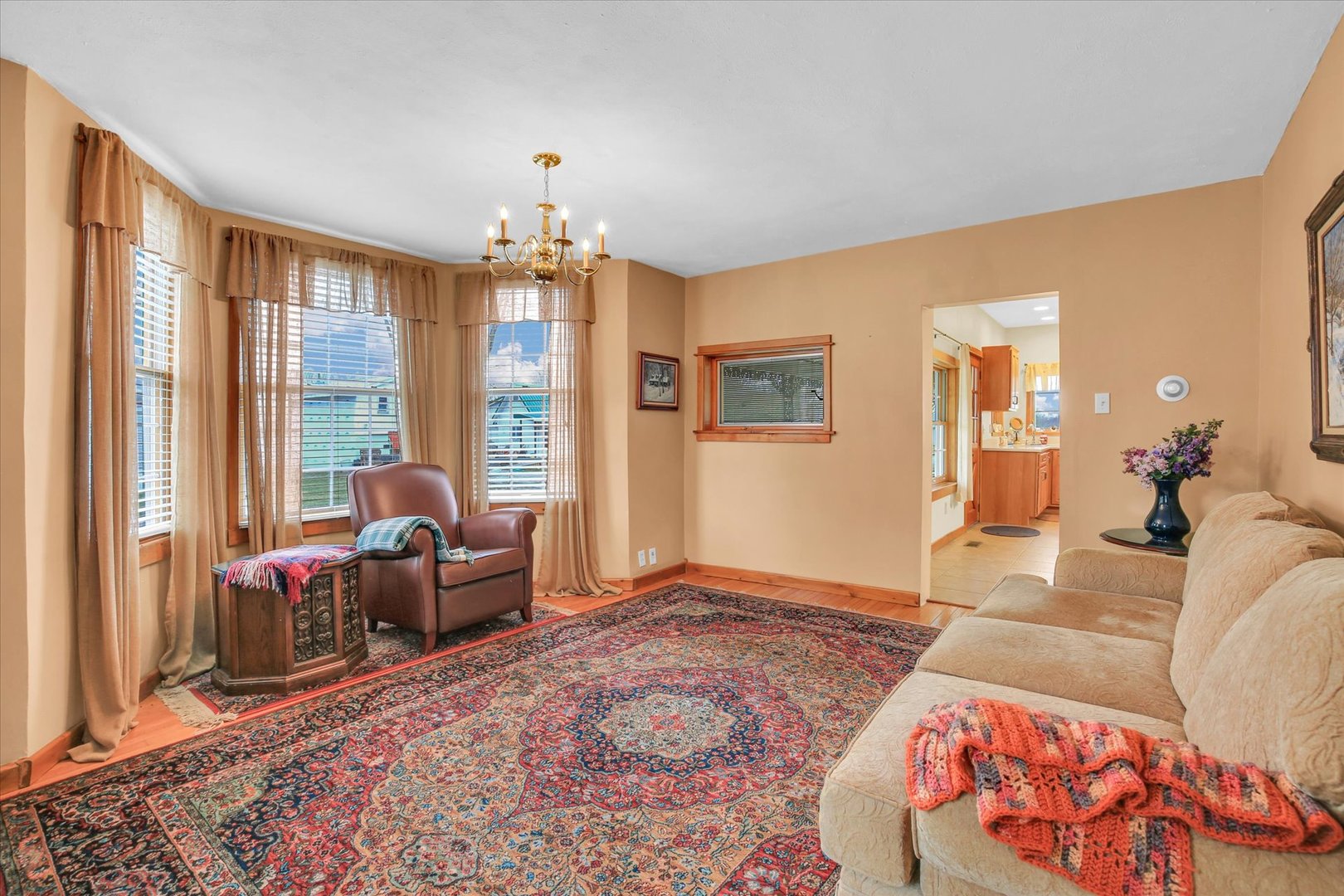 112 North Front Street Sadorus, IL 61872 - Photo 18 of 44 a living room with furniture and a large window