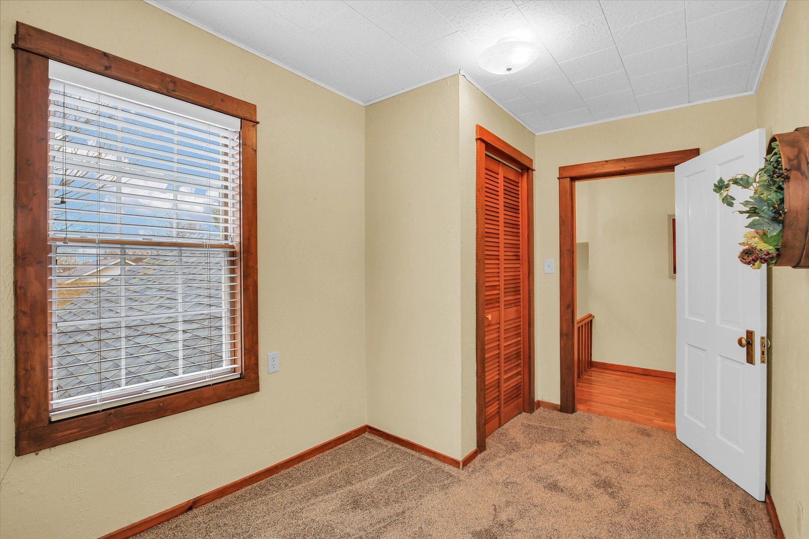 112 North Front Street Sadorus, IL 61872 - Photo 26 of 44 a view of an empty room with a window