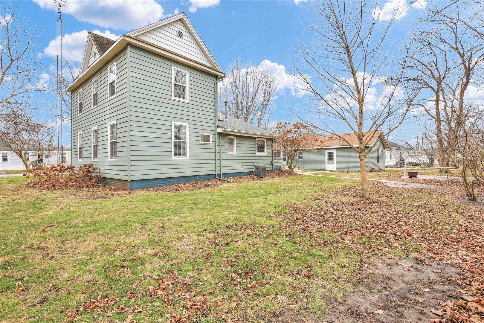 112 North Front Street Sadorus, IL 61872 - Photo 33 of 44 a front view of a house with a yard