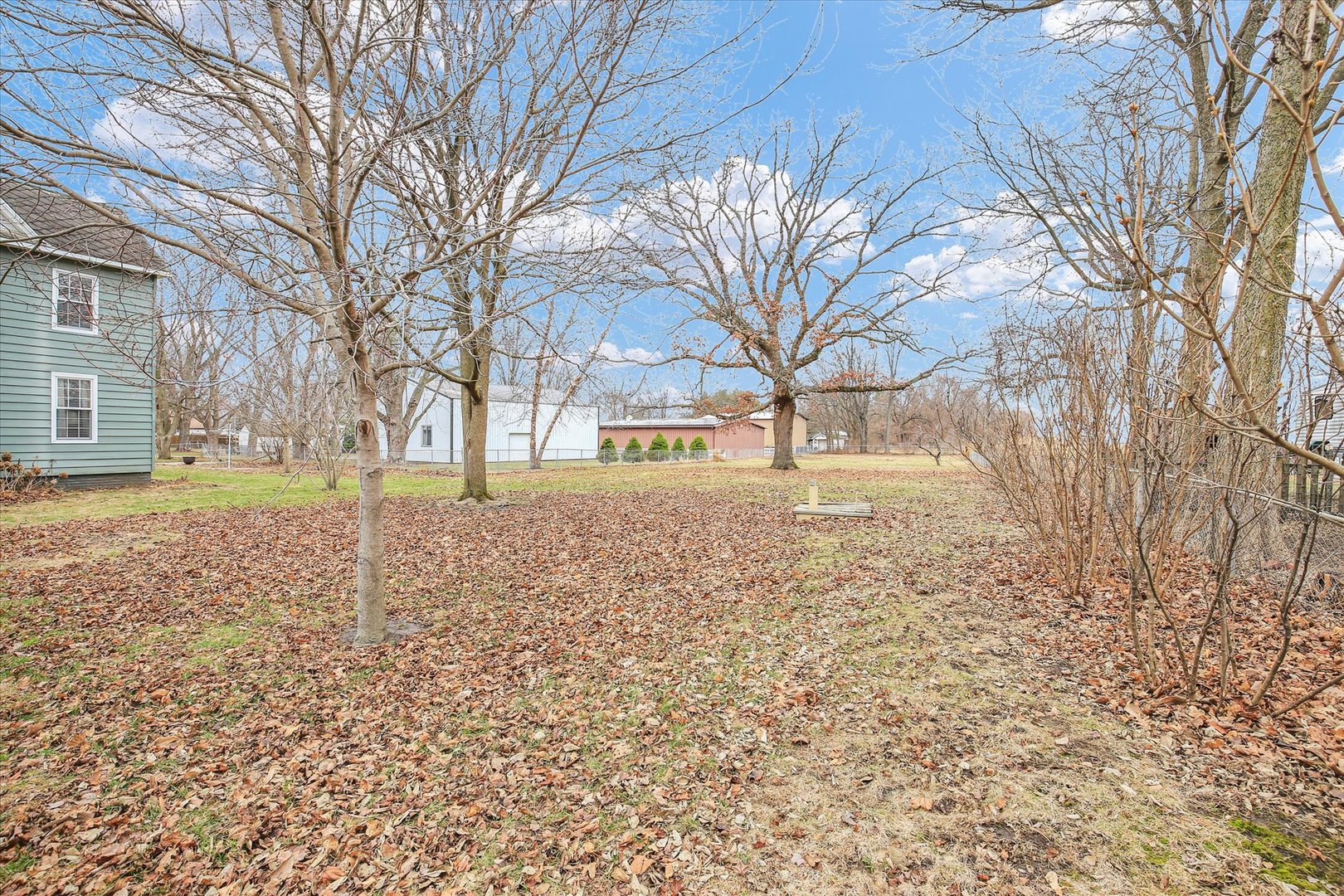 112 North Front Street Sadorus, IL 61872 - Photo 35 of 44 a brick building with trees in front of it
