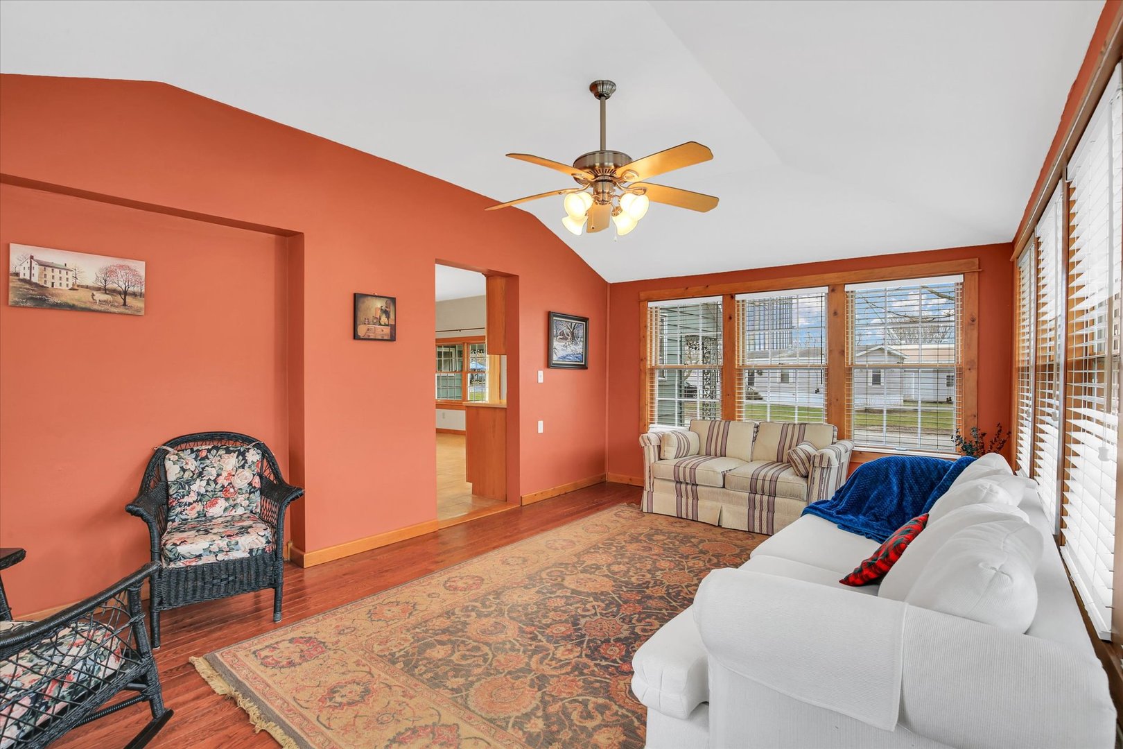 112 North Front Street Sadorus, IL 61872 - Photo 4 of 44 a living room with furniture a chandelier and a large window
