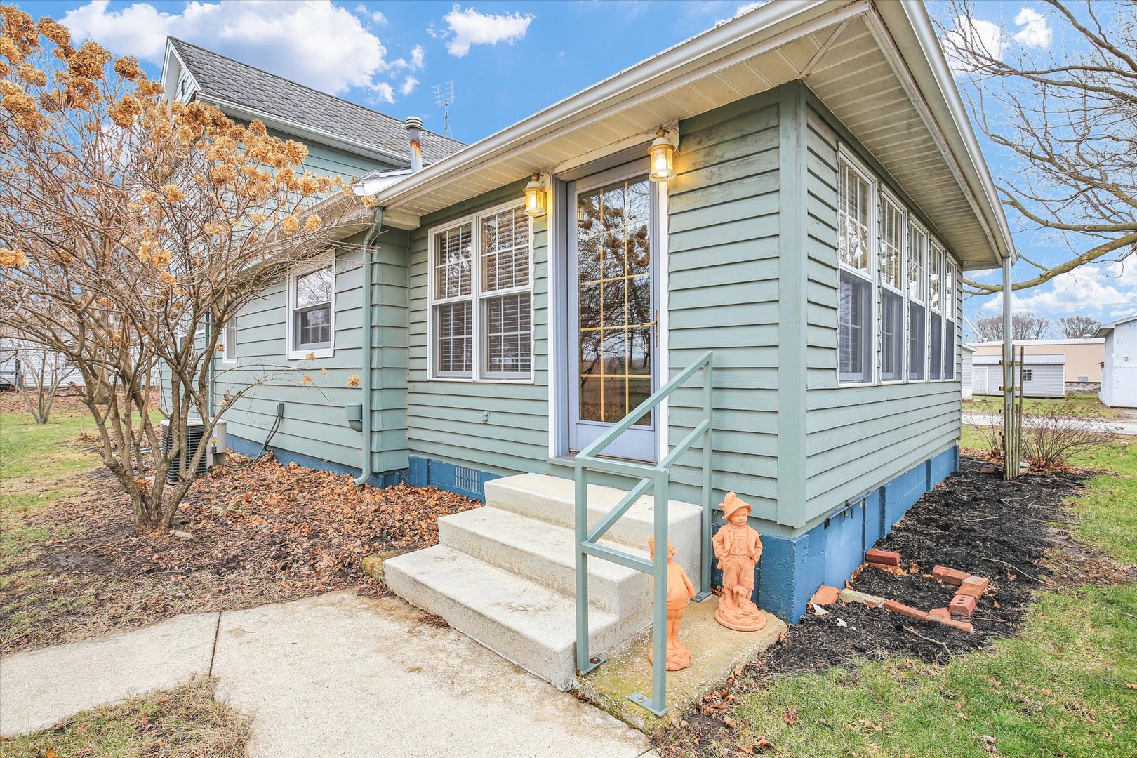 112 North Front Street Sadorus, IL 61872 - Photo 41 of 44 a view of a house with a yard