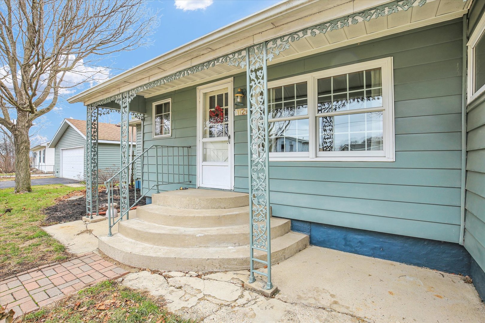 112 North Front Street Sadorus, IL 61872 - Photo 42 of 44 a view of a house with outdoor space