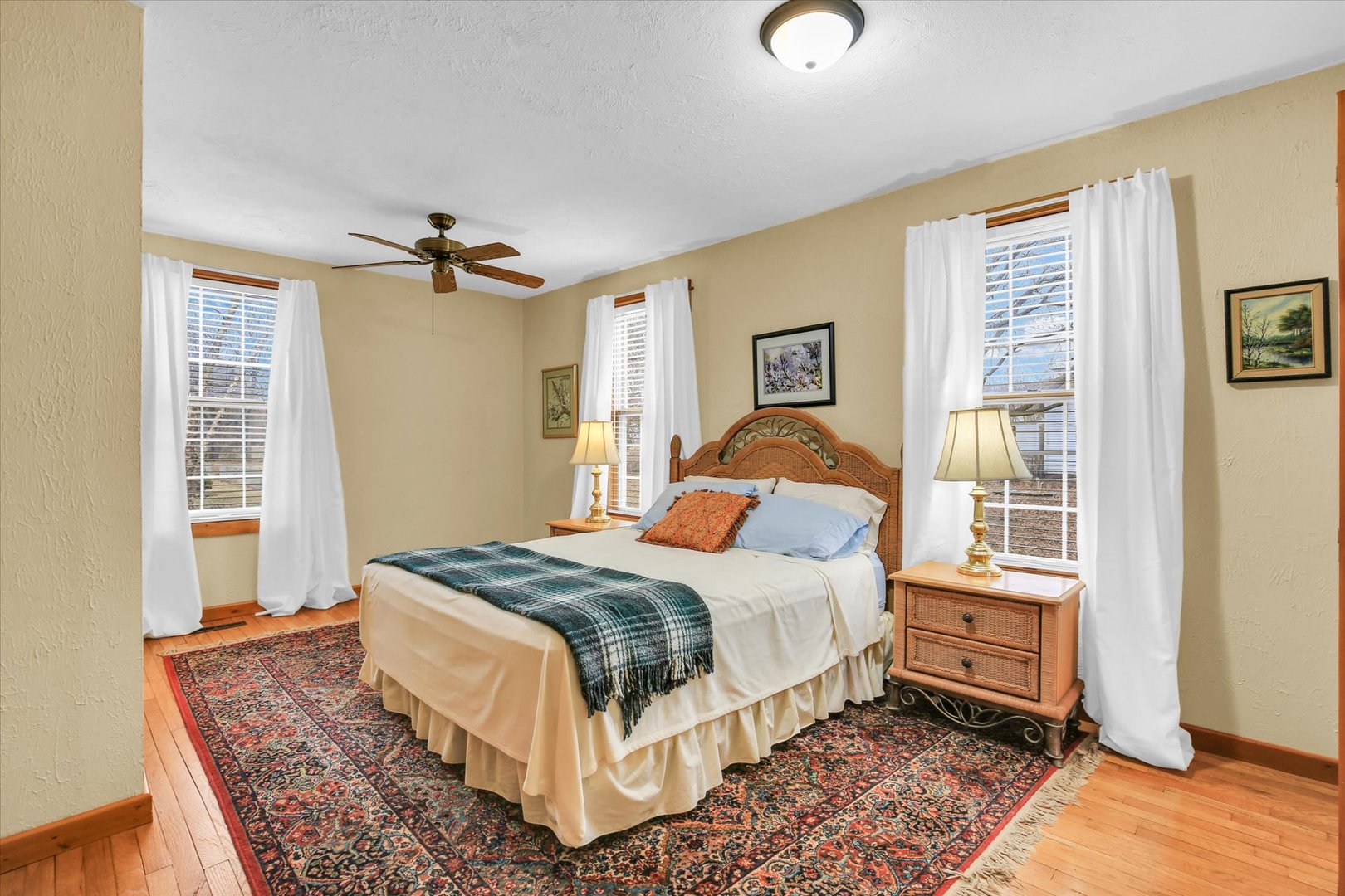 112 North Front Street Sadorus, IL 61872 - Photo 6 of 44 a bedroom with a bed and wooden floor