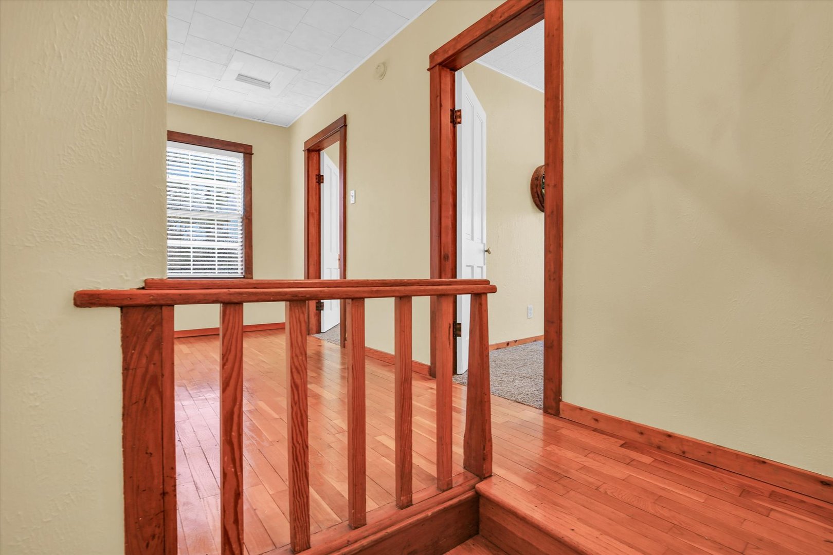 112 North Front Street Sadorus, IL 61872 - Photo 7 of 44 a view of a porch with wooden floor
