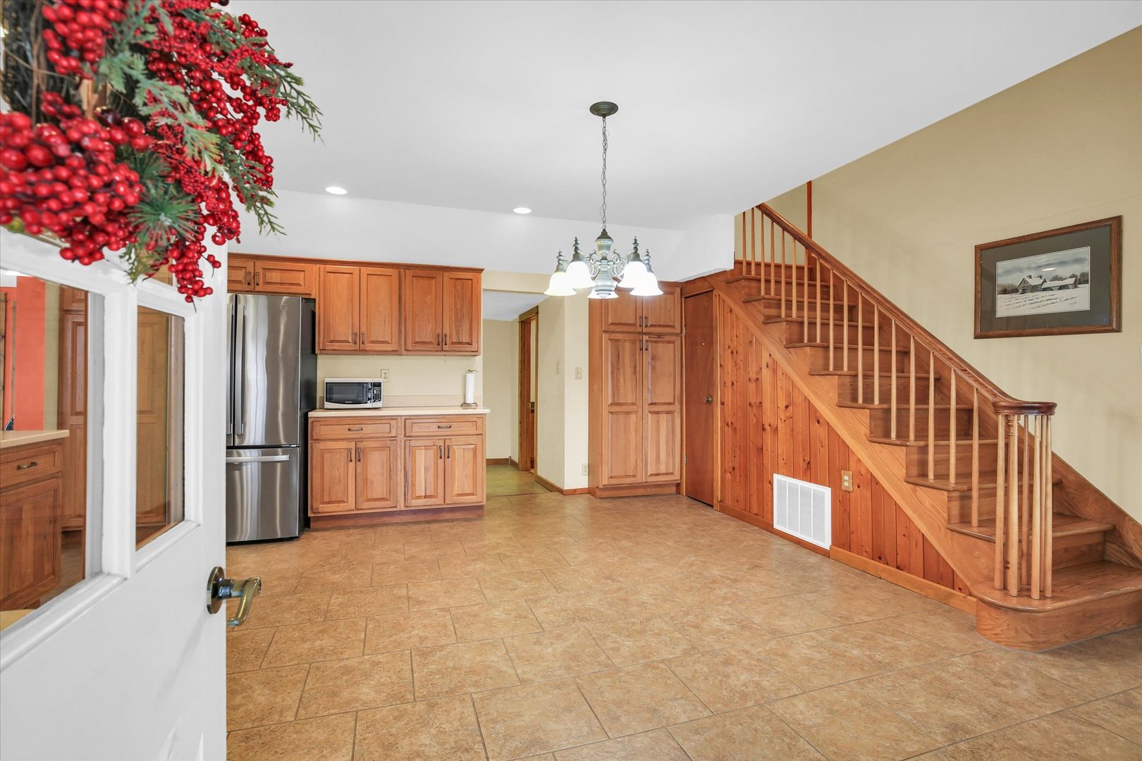 112 North Front Street Sadorus, IL 61872 - Photo 8 of 44 a view of a kitchen with refrigerator and an oven