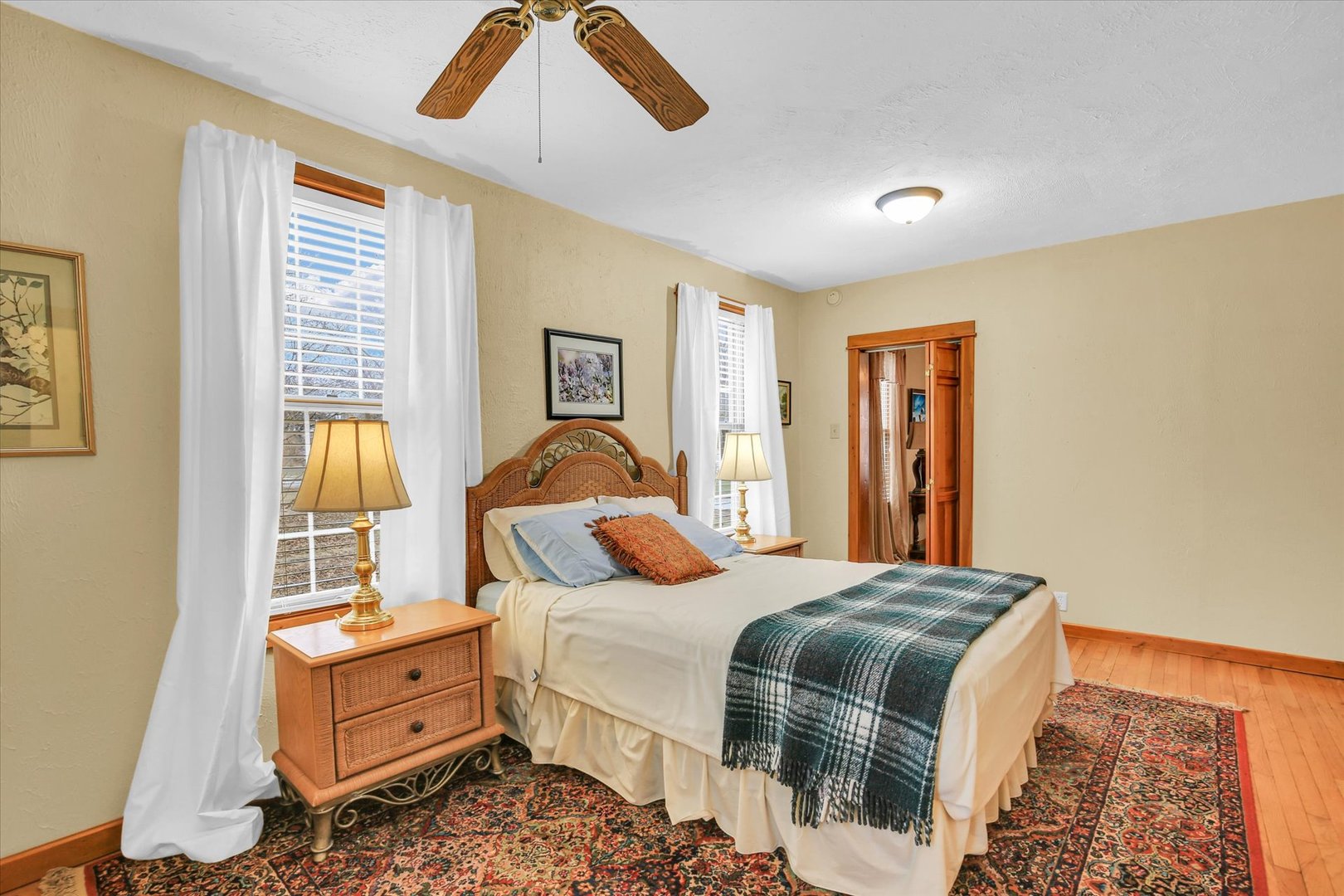 112 North Front Street Sadorus, IL 61872 - Photo 8 of 44 a bedroom with a bed and a window