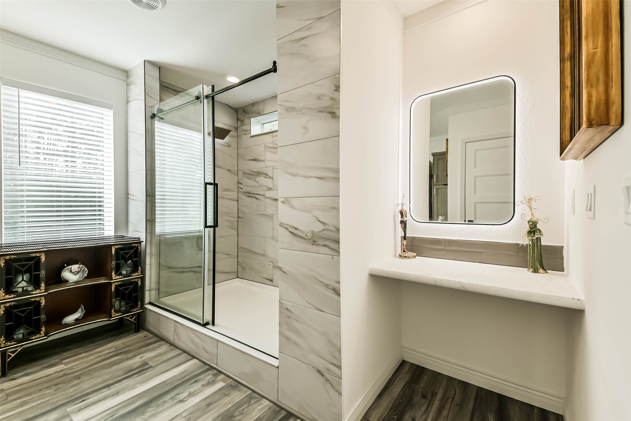 17700 Fregia Road Hull, TX 77564 - Photo 16 of 42 Master bath vanity area w/ stylish back-lit mirror