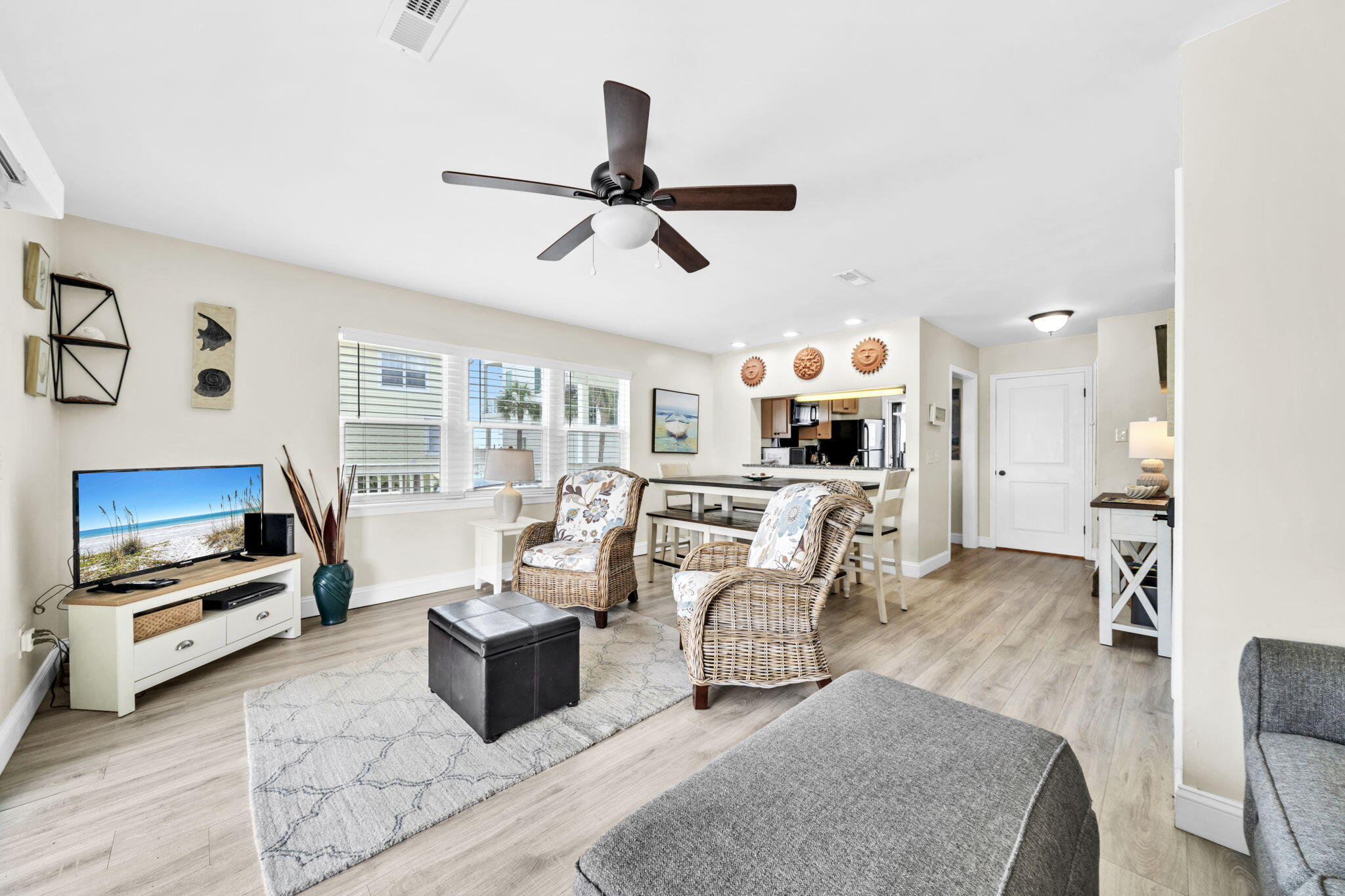 228 Walton Magnolia Lane, Unit 4 Inlet Beach, FL 32461 - Photo 16 of 45 a living room with furniture and a flat screen tv