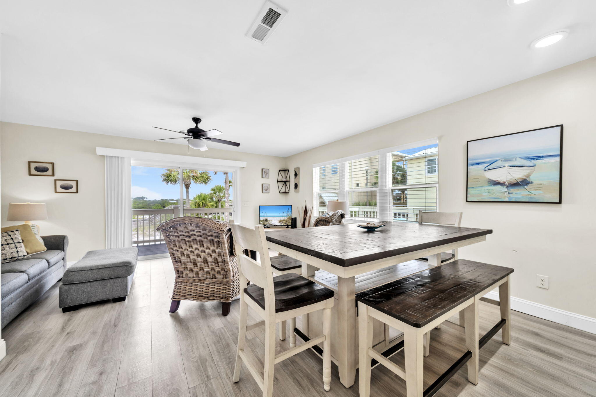 228 Walton Magnolia Lane, Unit 4 Inlet Beach, FL 32461 - Photo 18 of 45 a view of a dining room with furniture and wooden floor