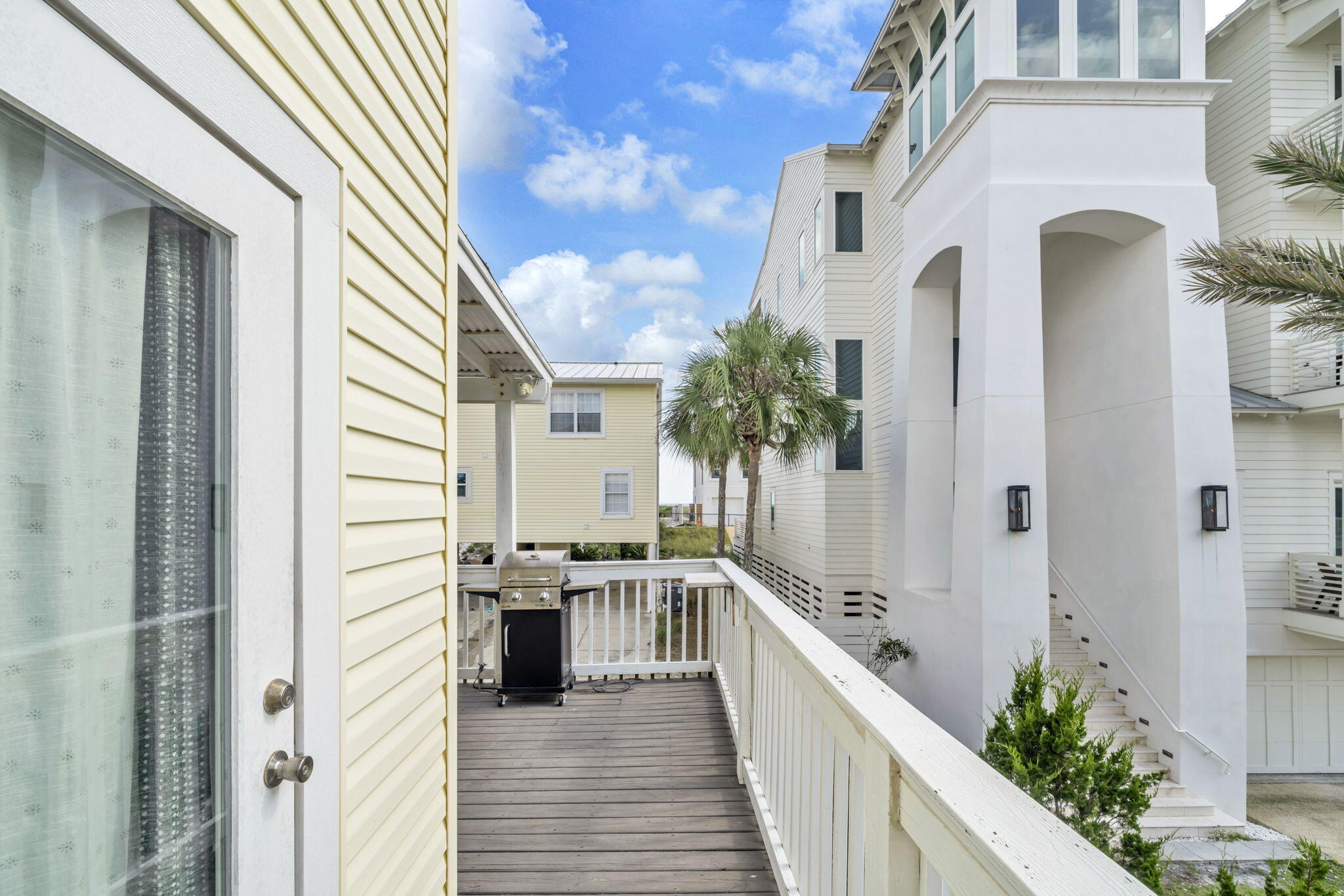 228 Walton Magnolia Lane, Unit 4 Inlet Beach, FL 32461 - Photo 23 of 45 a view of a balcony with potted plants