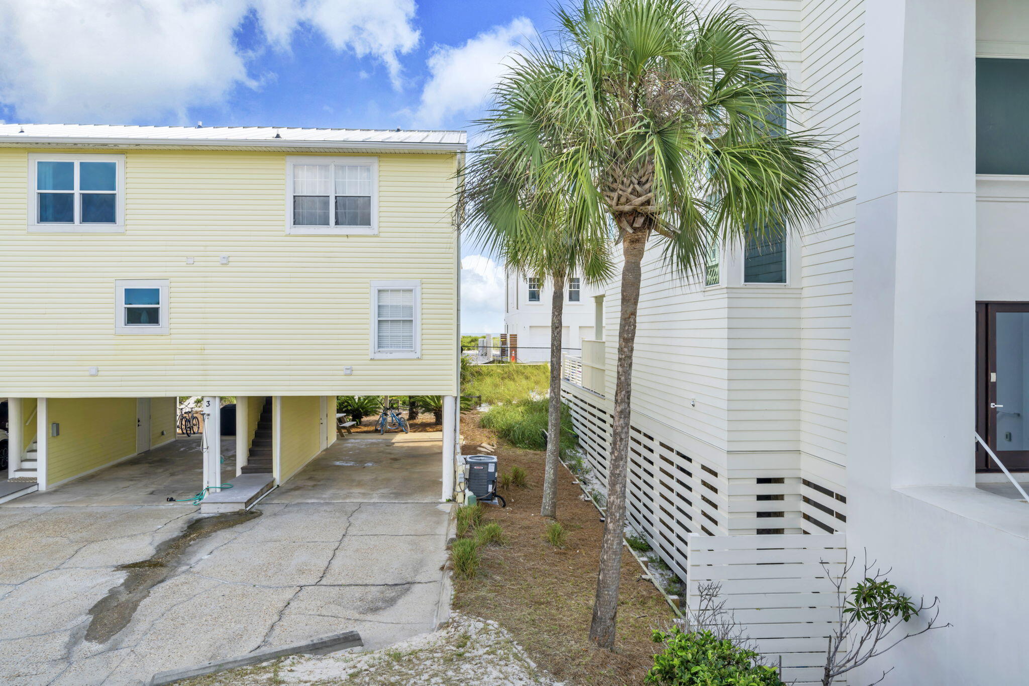 228 Walton Magnolia Lane, Unit 4 Inlet Beach, FL 32461 - Photo 24 of 45 a view of a house with backyard and sitting area