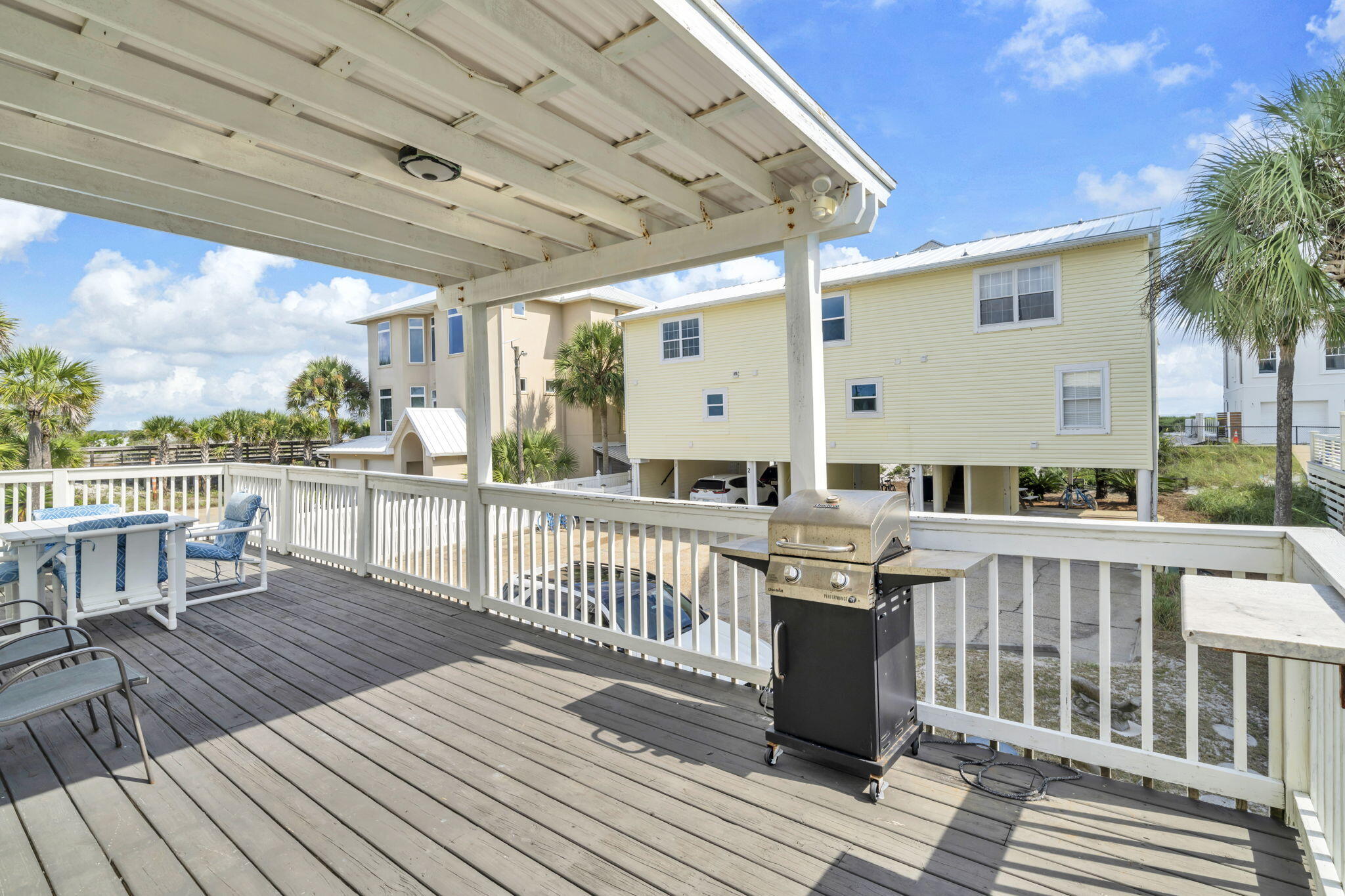 228 Walton Magnolia Lane, Unit 4 Inlet Beach, FL 32461 - Photo 25 of 45 a view of a balcony with wooden floor