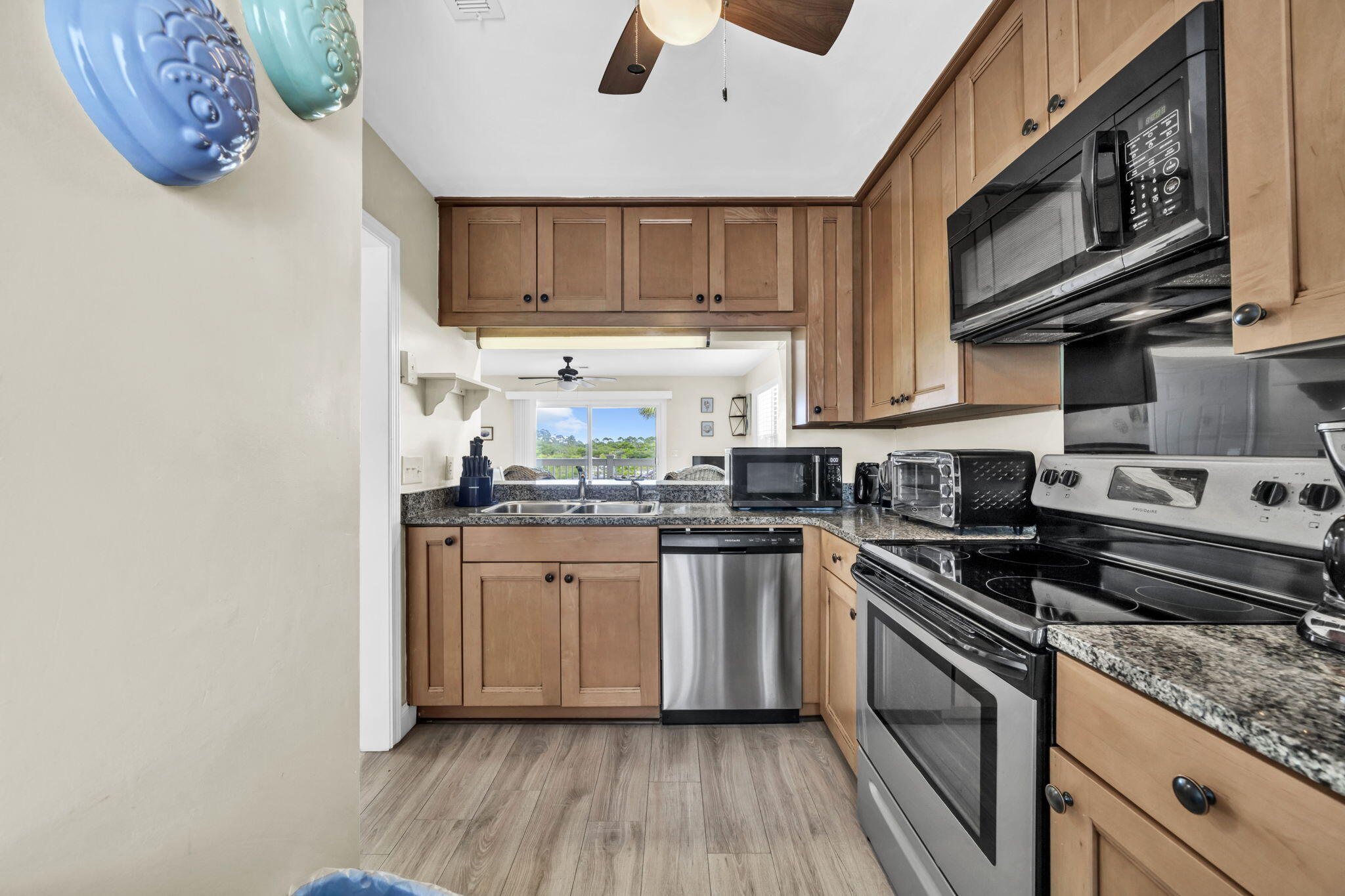 228 Walton Magnolia Lane, Unit 4 Inlet Beach, FL 32461 - Photo 28 of 45 a kitchen with stainless steel appliances granite countertop a stove and a sink