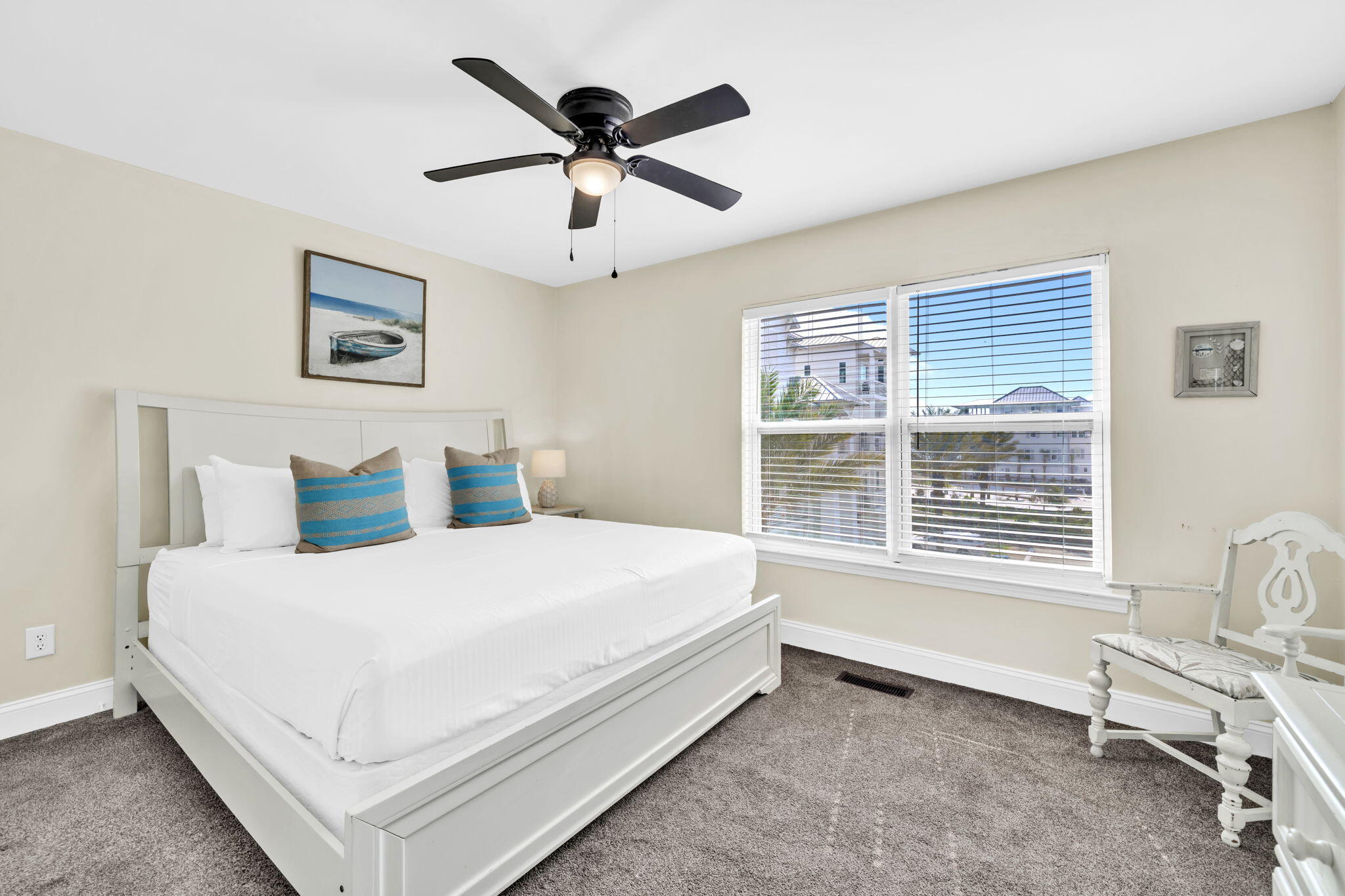 228 Walton Magnolia Lane, Unit 4 Inlet Beach, FL 32461 - Photo 31 of 45 a bedroom with a large bed and a window