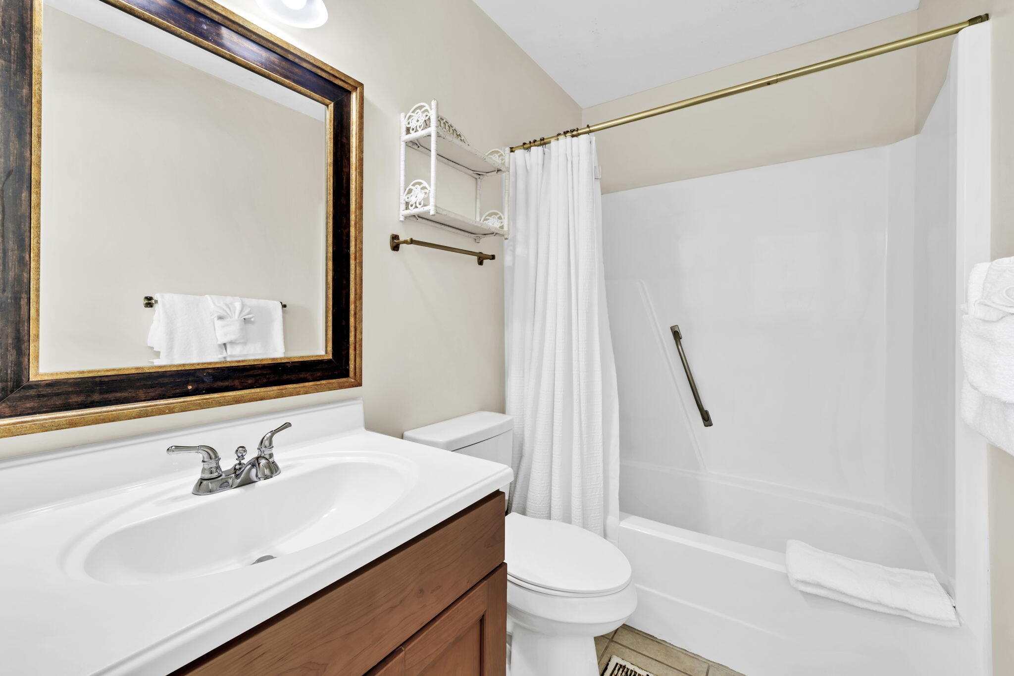 228 Walton Magnolia Lane, Unit 4 Inlet Beach, FL 32461 - Photo 33 of 45 a bathroom with a sink and a mirror